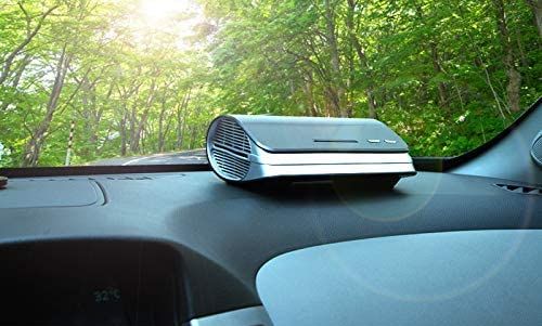 Car Ozone Air Purifier And Ionizer On Dashboard
