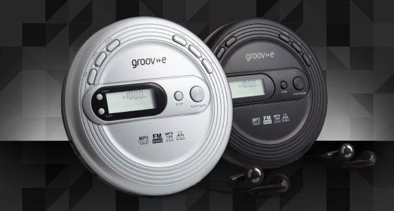 Small Radio CD Player With Black Earphones