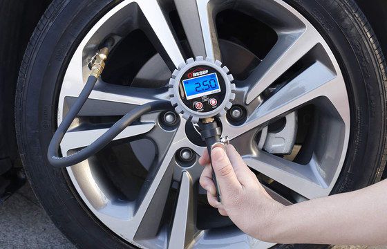 Tyre Pressure Gauge With Inflator Showing Blue LCD Screen