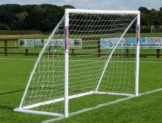 Portable Locking Football Goal Posts On Grass