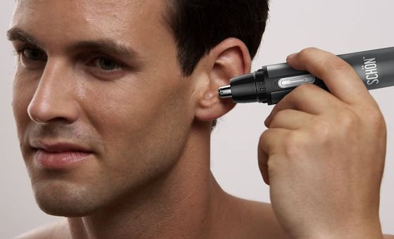 Nose And Ear Trimmer In Man's Ear Canal