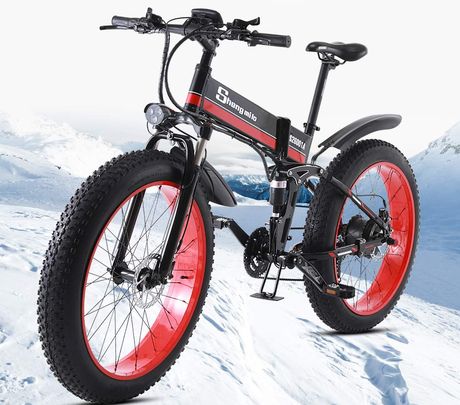 Electric MTB In Black And Red On Snow