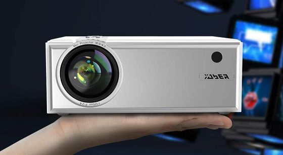 Yaber Mini Portable Projector White Portable Projector In Mans Hand