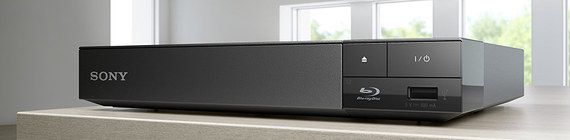 Black Blu Ray Player On Wood Table