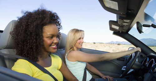 Girls Driving Red Car 2 Women In Sporty Vehicle