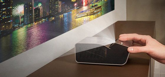 Portable UST Projector On Wood Desk