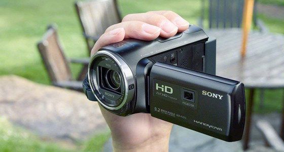 Black Camcorder With WiFi In Mans Hand