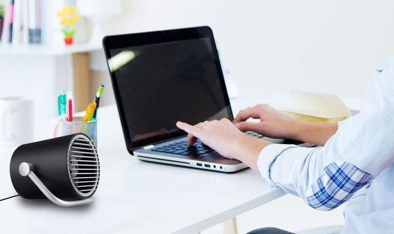 Small USB Silent Desk Fan On White Table