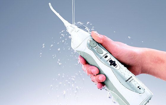 Get The Panasonic Irrigator Now Rechargeable Water Flosser In Mans Hand
