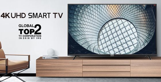 UHD TV On Wooden Sideboard