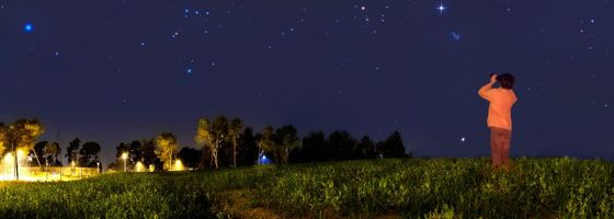 Man Using IR Night Binoculars