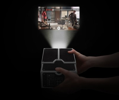 DIY Cardboard Smartphone Projector In Darkness On Wall