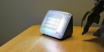 Oypla Fake TV Security Light On Wood Desk